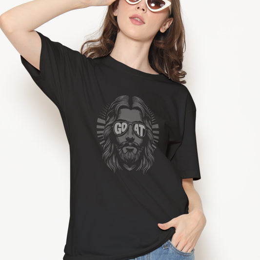 Woman wearing a black t-shirt with a graphic design on a white background